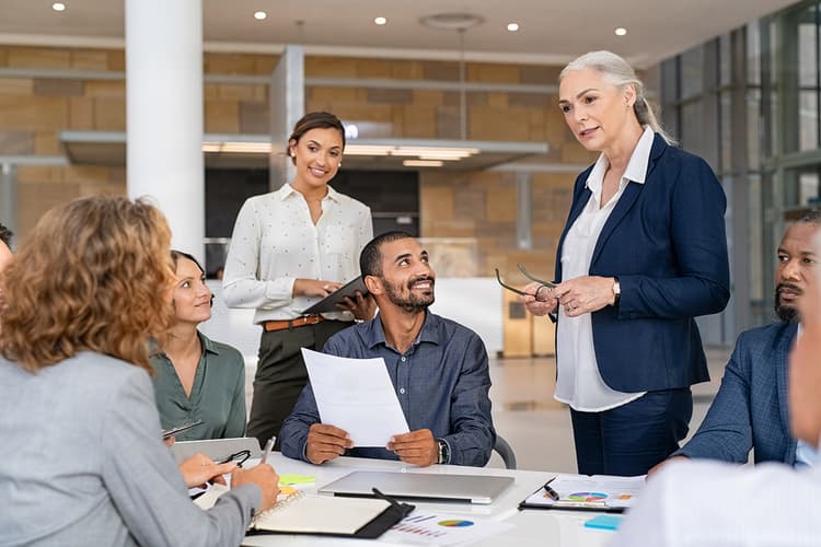 Office manager with team Office manager with team