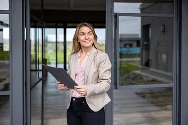 Property manager outside building Property manager outside building