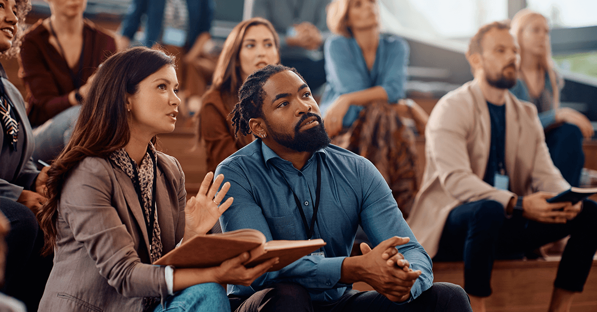 Audience Members Conversing During a Presentation Representing the Kansas Association of REALTORS® Broker Summit