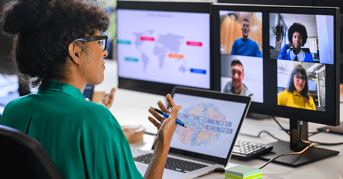 An Over the Shoulder View of a Woman Collaborating Virtually with Teammates Representing the Texas REALTOR® Executive Board Virtual Event