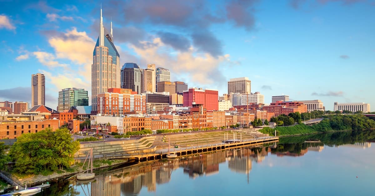 Panoramic View of Downtown Nashville, TN Reflected in the Cumberland River Representing the Berkshire Hathaway HomeServices Sales Convention