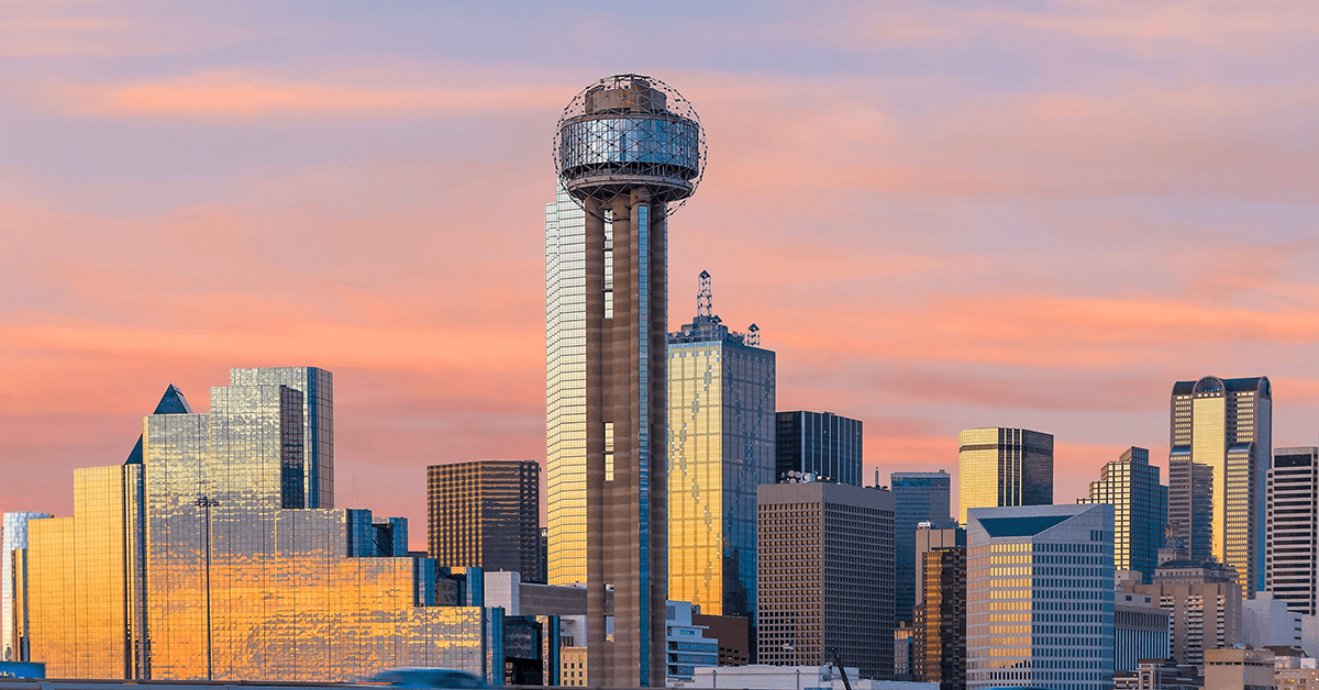 Skyscrapers Against a Twilight Sky in Dallas, TX Representing HousingWire's AI Summit