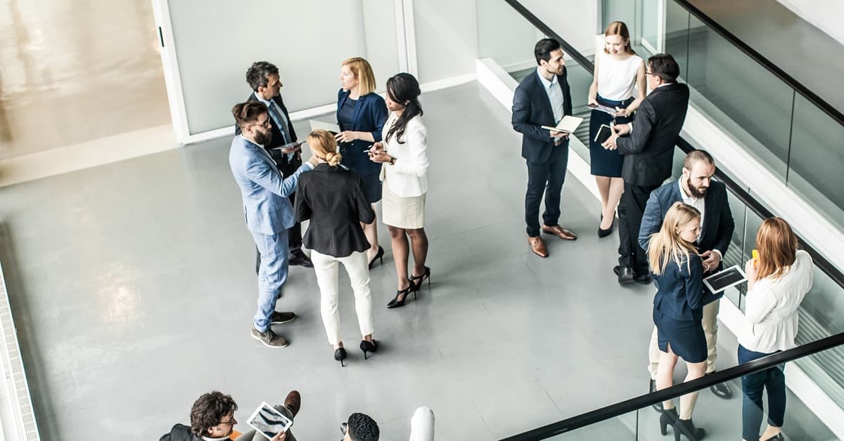 View From Above of Business Colleagues in an Office Lobby Representing the Region 12 Power Broker Event