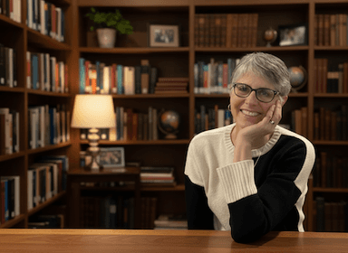 author Stacey Freed in a library