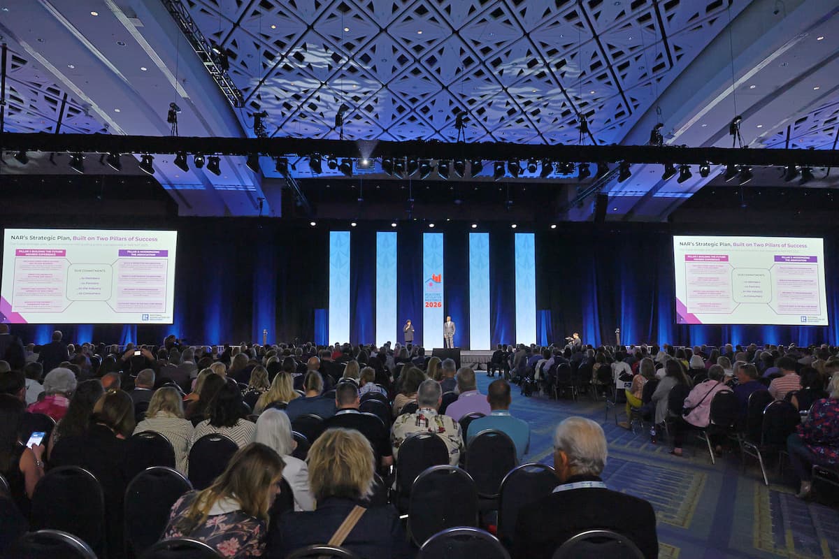 Nykia Wright and Kevin Brown onstage at the 2026 RLM Leadership Scoop, full stage view