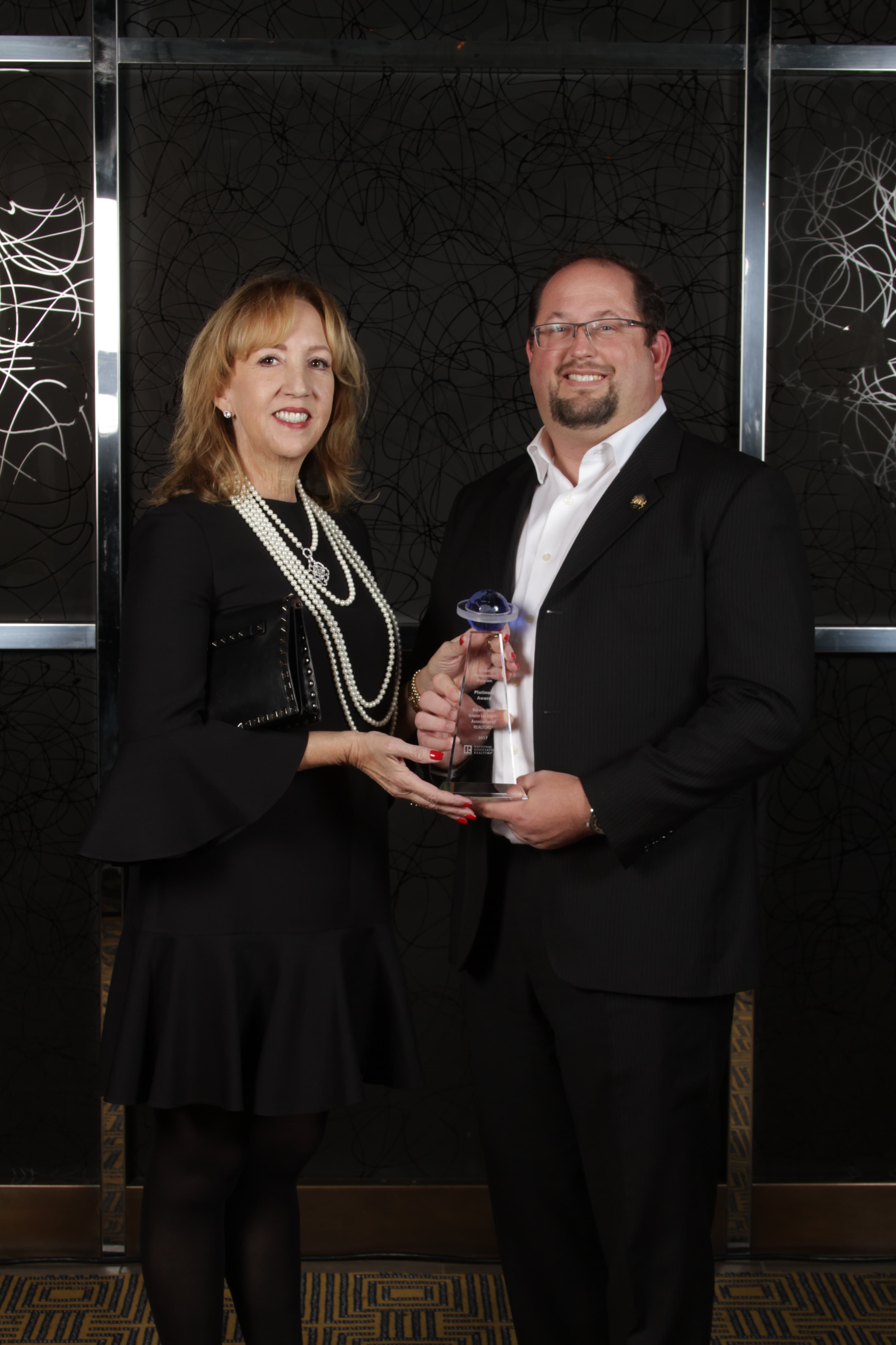 Sandra Miller and Chip Ahlswede, CEO