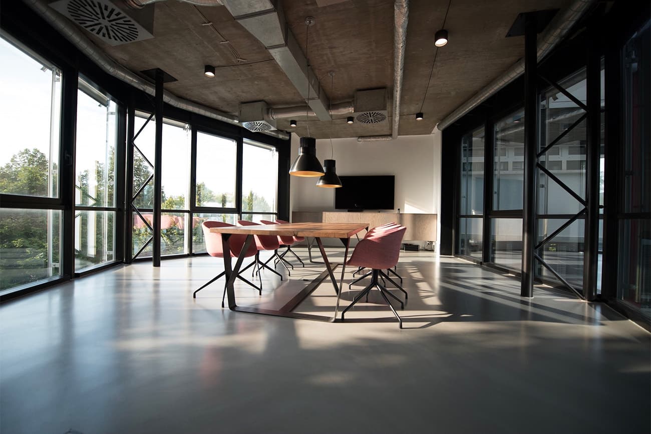 Conference room with table and chairs Conference room with table and chairs