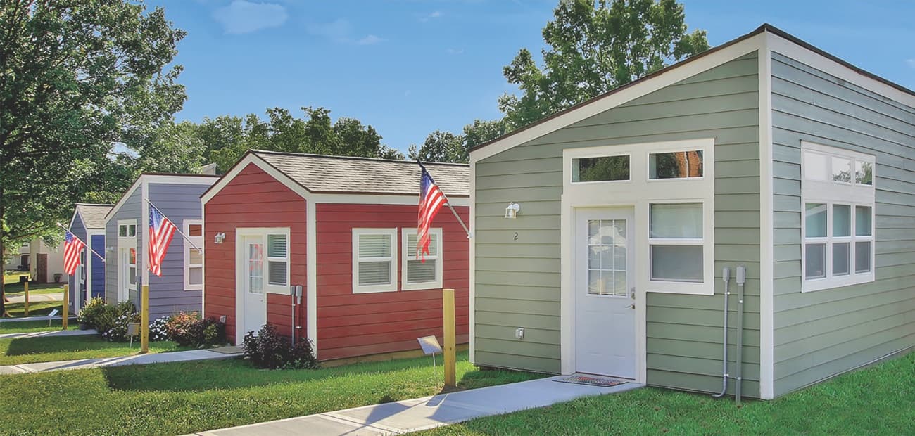 multicolored tiny homes on a sunny day