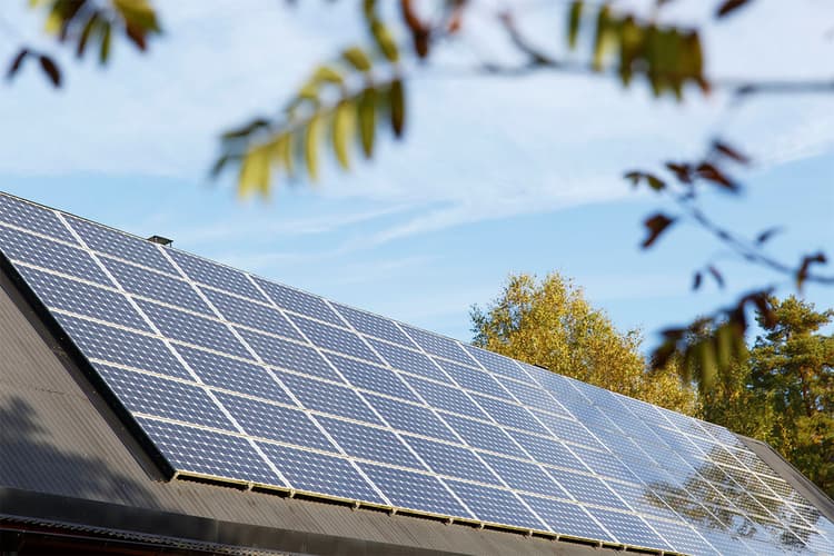 Solar panels on a home rooftop Solar panels on a home rooftop