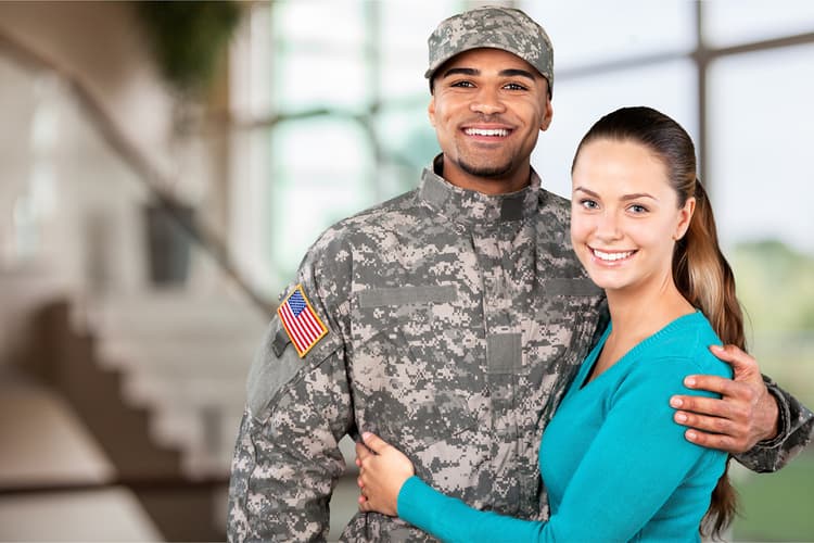 Woman with a man in military camouflage Woman with a man in military camouflage