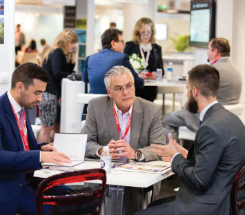 A member from Illinois getting down to business in the NAR-USA Pavilion's meeting space.