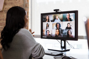 Woman on video conference talking with colleagues