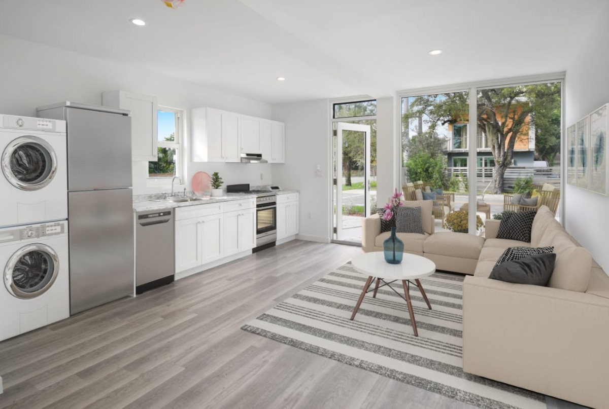 Interior, kitchen and living space, of shipping container converted into affordable housing, South Miami