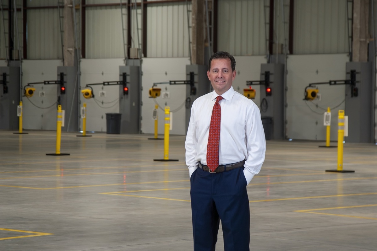 Matt Ritchie, CCIM, standing in warehouse property previously unused for 17 years.
