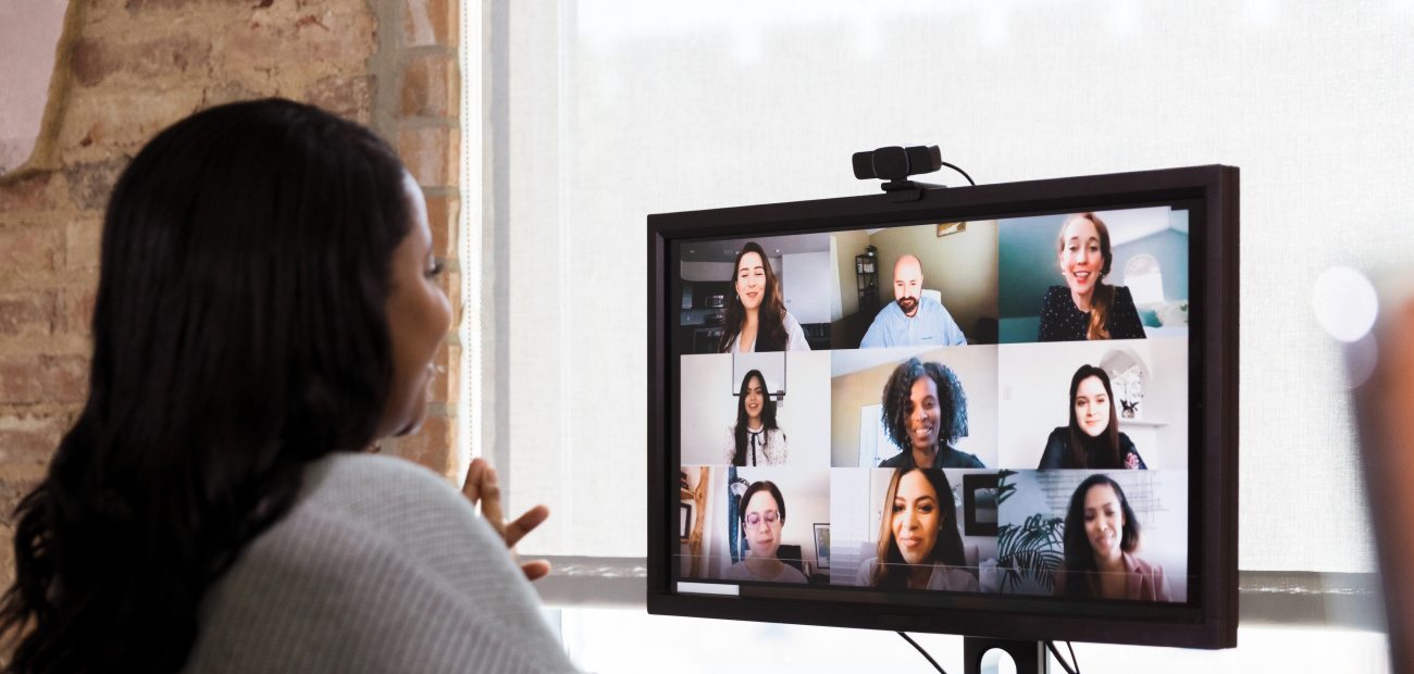 Woman on video conference talking with colleagues