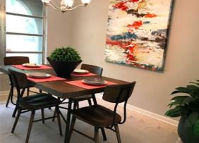 Dining Room table with painting