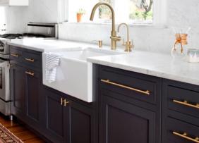 Black cabinets with brass hardware