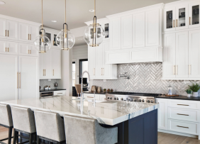 Kitchen with white cabinets and blue under painting