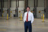 Matt Ritchie, CCIM, standing in warehouse property previously unused for 17 years. 