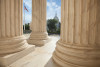 View of U.S. Capitol between columns